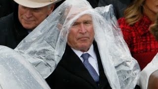 George W Bush struggles with his poncho at Trumps inauguration [upl. by Nollid]